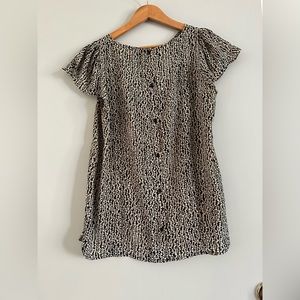 LOFT reversible flutter sleeve shirt. Buttons down one side and solid on other